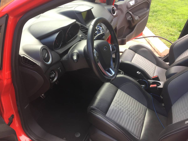 Illustration for article titled At $12,900, Could This 2014 Ford Fiesta ST Be The Red Rocket In Your Pocket?
